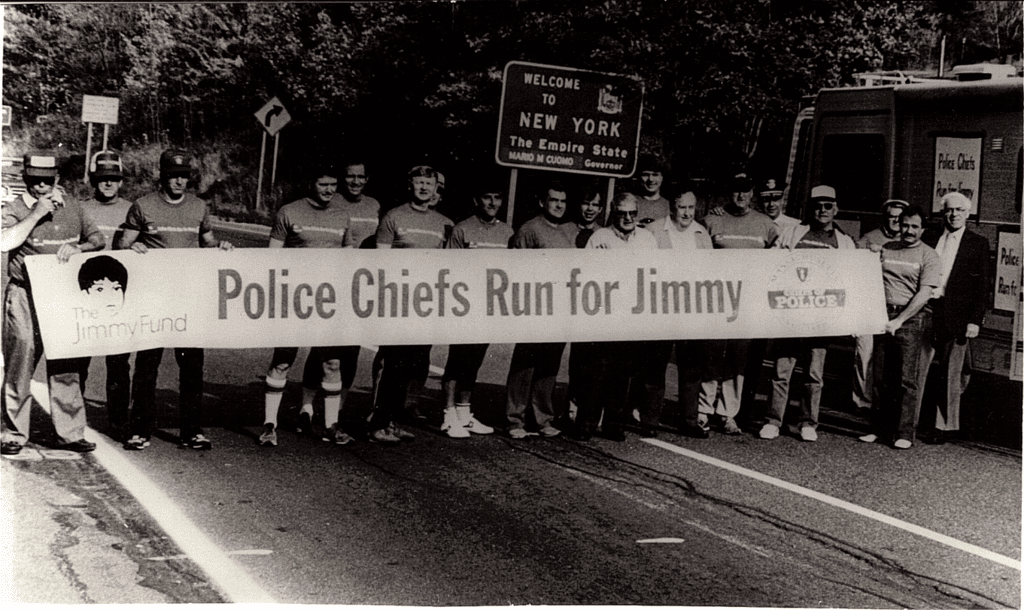 The line up to start the first Run for Jimmy September 1984. Chief Bob Johnson sixth from the left the brainchild of the Run for Jimmy.